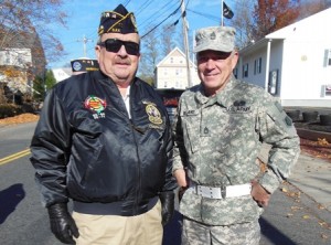 Bob Page (left), parade coordinator for the Marlborough Veterans Council, and Chuck Beland, a member of the United States Army for the past 24 years who will be deployed again in a few months.