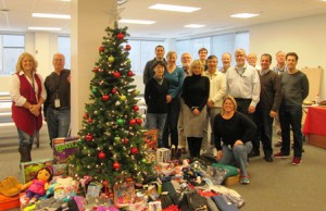 ViaSat employees with some of the gifts to be donated to local kids in need 