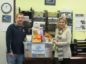 Christine Peterson, an office assistant with ViaSat and Steve Zepf, unit director, Boys and Girls Clubs of MetroWest
