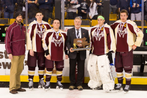 Algonquin coach Andy McGowan and captains Joe Sullivan, Alex DiPaduo, Mike Tascione and Justin O’Connell receive their trophy.