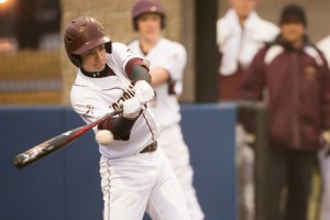 Algonquin senior Eric Hart bats in the first inning the game. against Shepherd Hill.