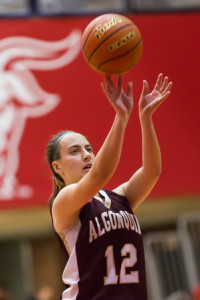 The ball leaves the fingertips of Algonquin’s Caroline Leonard as she shoots a free throw