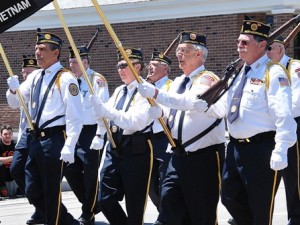 The Color Guard of the American Legion Vincent F. Picard Post 234 leads the parade.