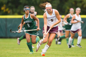 Algonquin senior Juliet Chapin (#5) brings the ball up field in a game against Wachusett 