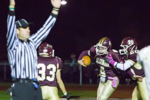 Algonquin’s Ryan Barry (#4) celebrates his game winning touchdown with Sean Hamling (#33) and Colin Robinson (#20).