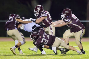 Algonquin football kicks off season with convincing win over Worcester North