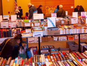 Shoppers browse while attending last year’s Big Book Sale at the Northborough Free Library.
