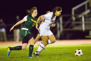 Tantasqua’s Maddison Mayberry and Algonquin's Annemarie Moy fight for the ball.