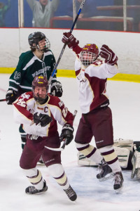Algonquin’s Justin O’Connell (#22) celebrates after scoring the game winning goal as teammate Joe Sullivan looks on.