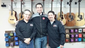 (l to r) Instructor Victor Helenic, General Manager Chris Bosch, and owner Jack Shanahan at the opening of the second location of Jack’s Guitar Garage in Grafton. Photo/submitted 