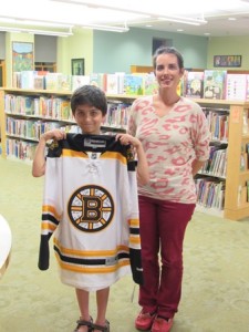 Krish Satishkumar (l) with Katrina Ireland, children's librarian at the Northborough Free Library. (Photo/Bonnie Adams)