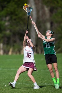 Algonquin’s Kendyl Finelli and Wachusett’s Ashley Williamson vie for the ball  