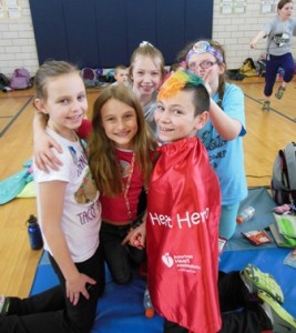 Fourth-grader Hayley Norton and fifth-graders Catey Johnson, Heart Hero Chandler LaValle, Madison Norton and Heather Loretta show their support for the Jump Rope for Heart event. LaValle had open heart surgery when he was a few days old.