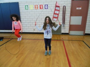 Second-grader Lindsay Ogar jumps the afternoon away.