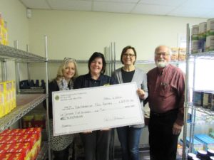 Northborough Lions Club present the Northborough Food Pantry with a $2,500 donation: (l to r) Lions Club member Lorna Helms, Lions Club King Lion Kate Shaw, Northborough Food Pantry Director Ann Taggart, and Lions Club Director Michael Healy. (Photo/submitted)