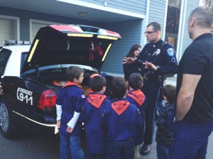 Officer Martin gives Northborough Pack 55 Tiger Scouts a tour of the police station 