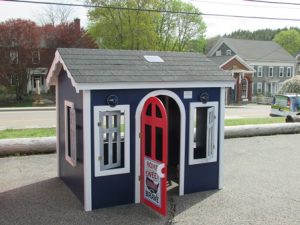 Habitat for Humanity volunteers build playhouses for families of veterans