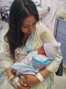 Dr. Bhartiben Patel holds her new son, Devdas Vipulbhai Patel.  (Photo/submitted)