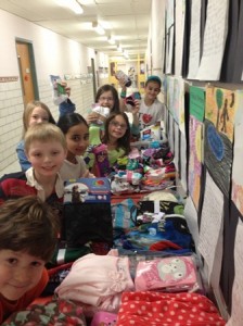 Third graders from Northborough's Peaslee Elementary School with the items they collected for charity.