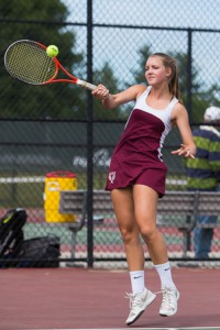 Algonquin’s Alexis Almy returns a serve in first round of the Central Division 1 tennis playoffs.