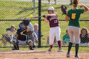 Algonquin’s Caty Lazo (#13) swings at a pitch during the quarter final round of the Central Division 1 softball playoffs.