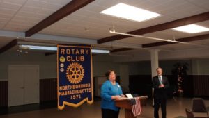 Kathy Joubert accepts the Pride in Workmanship award from the Northborough Rotary Club as nominator George Pember looks on. (Photo/Christine Galeone)