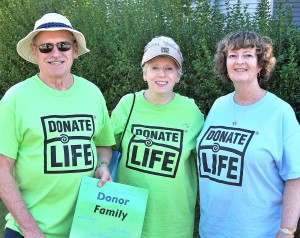 Gathered prior to the recent Spirit of Shrewsbury Fall Festival parade are (l to r) Ray and Sue Cote of Shrewsbury with Penny Brown of Northborough. They participated in the parade with other volunteers of Donate Life New England. (Photo/Ed Karvoski Jr.)