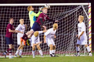 Westborough sophomore Spencer Nagi attempts to head the ball into the goal.