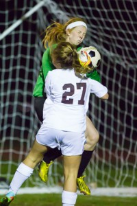 Westborough keeper Chelsea Taylor collides with Algonquin’s Brianna Williams while making a save.