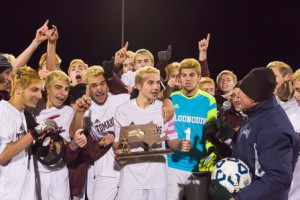 The Algonquin boys’ soccer team receives its trophy for winning the Central Mass. Division 1 finals.