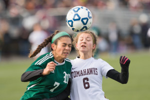 Wachusett’s Annie Vanslette (#7) and Algonquin’s Sydney Carney (#6) collide as they attempt to make a play.