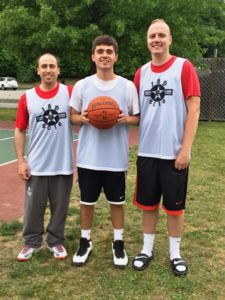 (l to r) Peter Berman, co-founder and chief operating officer of Coaching4Change, Sam Piotrowski, “commissioner” of the Spring Classic, and volunteer Matt Galligan