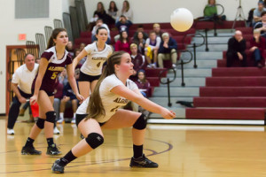 Algonquin’s Kristen Cooley (#23) prepares to dig the ball.
