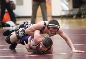Shea Garand attempts to pin his opponent to the mat. 