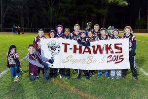 The T-Hawks were honored during halftime of Friday night’s Algonquin Regional football game against Fitchburg Nov. 13. Photo/Jeff Slovin