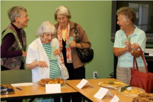 (l to r) Pat Cluff, Rosi Heinsohn, Lillian Litchfield and Agnes Sagerian review the selections
