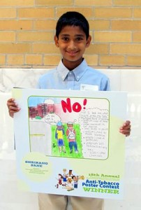 Northborough sixth-grader Shrirang Sane holds his winning poster. (Photo/submitted)