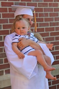 Baby Eddie threatens to steal the limelight from this graduate.