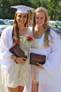 Karina Palmer (l) and Emma Barker (r) show off their hard-earned diplomas.
