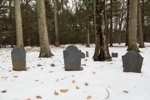 Three of the headstones are still standing at the Brigham Street Old Burial Ground, with footstones behind them.