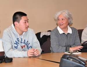 Henry Liu and Ning Yin participate in a bilingual group meeting at Algonquin Regional High School. File photo/Ed Karvoski Jr. 