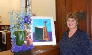 Gardeners Club Treasurer Susan Pyne next to her interpretation of Samantha Chase's 