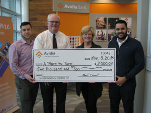 (l to r) Michael Petrillo, Framingham senior universal banker of Avidia Bank; Mark O’Connell, CEO & president of Avidia Bank; Joanne Barry, executive director of A Place to Turn; Fernando Ferreira, Framingham assistant branch manager of Avidia Bank.