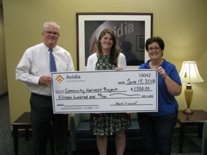 (l to r) Mark O’Connell, president & CEO of Avidia Bank; Cordelia Lyon, executive director of the Community Harvest Project; Anne Marie Lourens, main office assistant branch manager of Avidia Bank. Photo/submitted.
