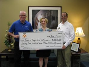 (l to r) Mark O’Connell, president and CEO of Avidia Bank; Kat Alix-Gaudreau, executive director of the River’s Edge Arts Alliance; Keith Dwinells, Hudson Main Office branch manager of Avidia Bank Photo/submitted 