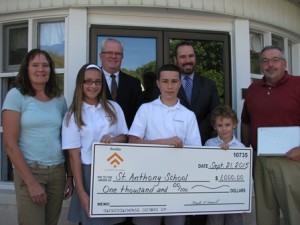 (l to r) Pamela Prendergast, St. Anthony Jr. High School teacher; Mark R. O’Connell, president & CEO of Avidia Bank; Todd Wood, Leominster Branch manager of Avidia Bank; and Matthew Gauvin, St. Anthony Jr. High School teacher with St. Anthony students. (Photo/submitted)