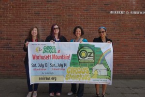 Worcester JCC members (l to r) Jody Fredman, Shannon Nolley, Jess Bader and Cynthia Gray hold a sign announcing the upcoming shows. 
