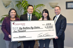 (l to r) Cornerstone Bank’s EVP, Chief Administrative Officer and Chair of the Charitable Donations Committee Susan A. Gunnell; Big Brothers Big Sisters of Central Mass./Metrowest, Inc.’s CEO Jeffrey Chin; Southern Worcester County’s Program Specialist Calleigh Leach; and Cornerstone Bank’s President and Treasurer Todd M. Tallman Photo/submitted