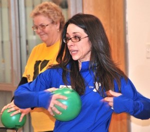 Christine Salovardos leads a class of LIVESTRONG at the Boroughs Family Branch YMCA in Westborough. (Photo/Ed Karvoski Jr.)