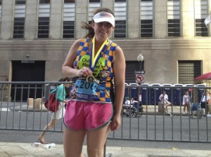 Kate Gamache shows off her medal after completing the 2012 Boston Marathon Photo/submitted 
